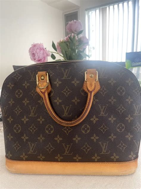 louis vuitton alma fake or real